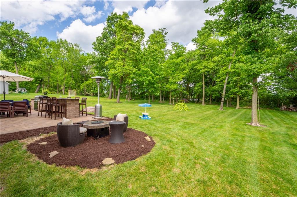 5018 Firwood Drive Canonsburg, PA 15317 - Photo 42 of 50 a view of a backyard with sitting area