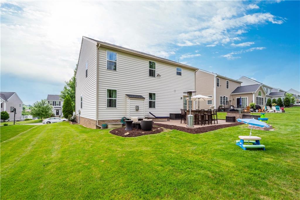 5018 Firwood Drive Canonsburg, PA 15317 - Photo 43 of 50 a view of a house with sitting area and swimming pool