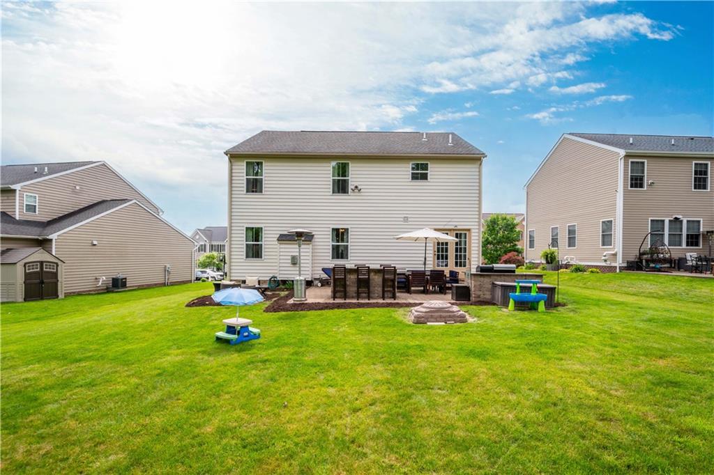 5018 Firwood Drive Canonsburg, PA 15317 - Photo 44 of 50 a view of a house with backyard porch and outdoor seating