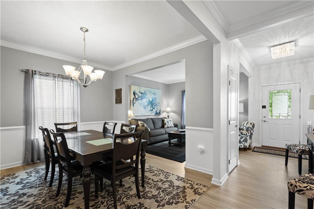 5018 Firwood Drive Canonsburg, PA 15317 - Photo 6 of 50 a view of a dining room with furniture and wooden floor