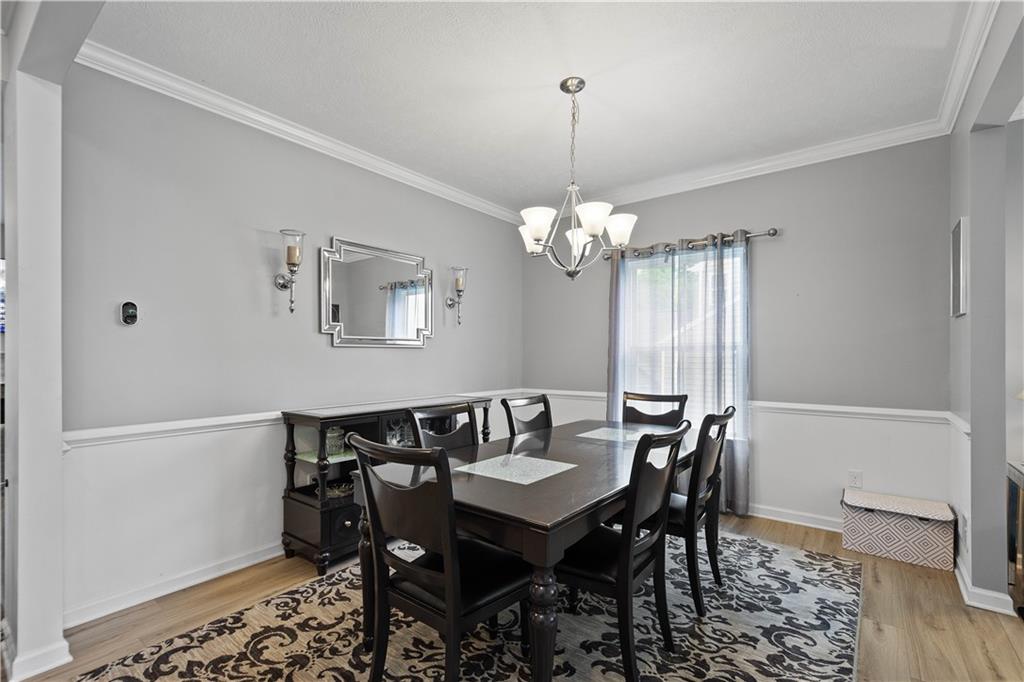 5018 Firwood Drive Canonsburg, PA 15317 - Photo 7 of 50 a view of a dining room with furniture and wooden floor