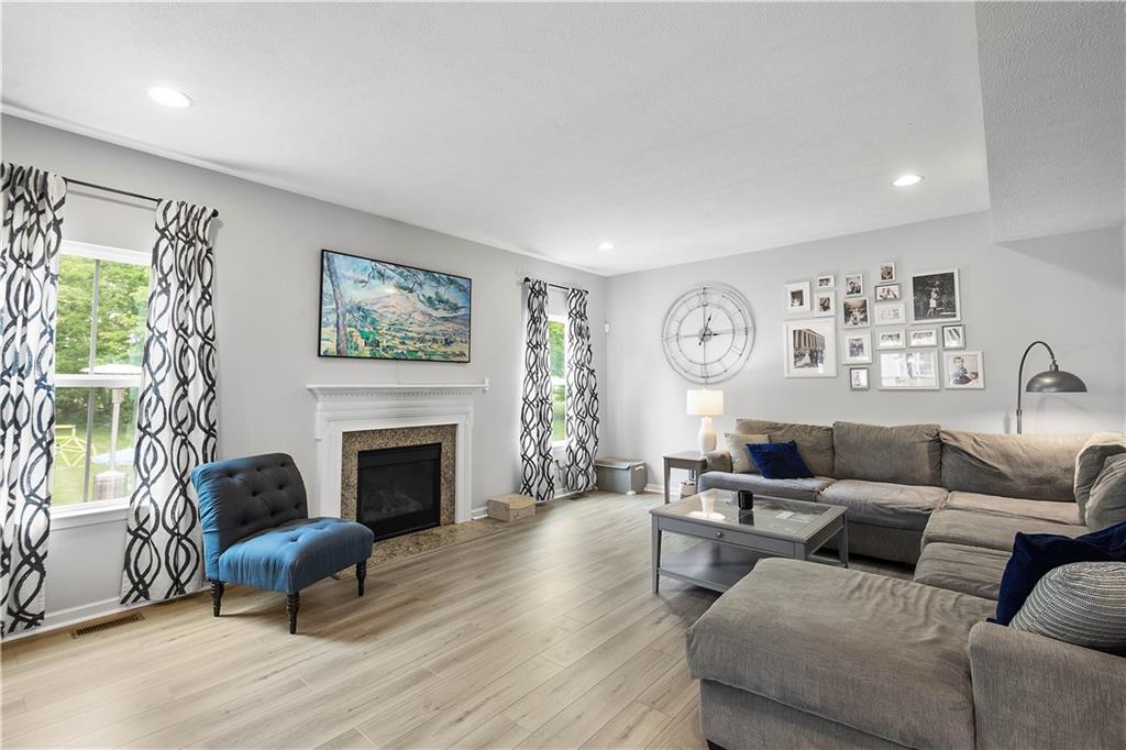5018 Firwood Drive Canonsburg, PA 15317 - Photo 9 of 50 a living room with furniture and a fireplace