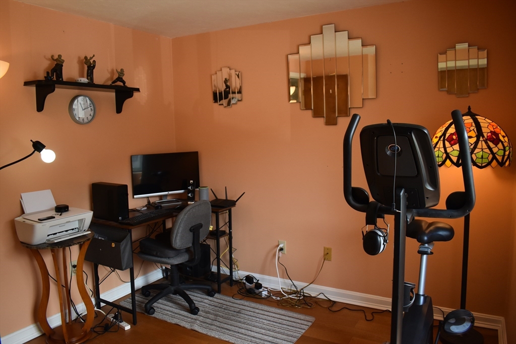 11 Hulbert Road, Unit 1 Worcester, MA 01603 - Photo 4 of 7 a view of workspace with wooden floor and gym equipment