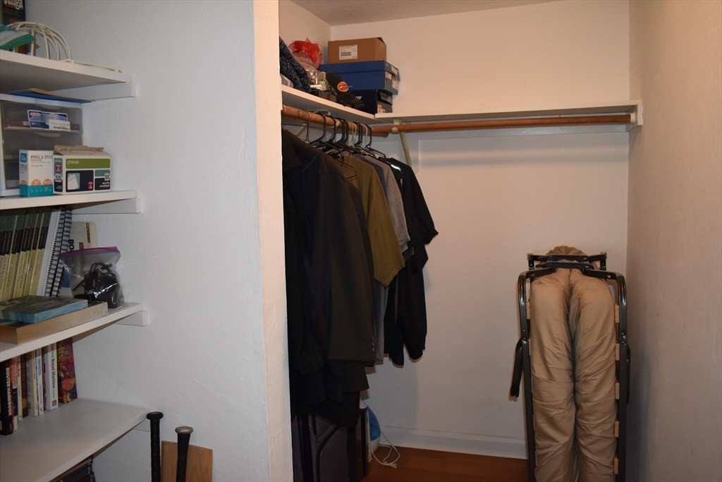 11 Hulbert Road, Unit 1 Worcester, MA 01603 - Photo 7 of 7 a view of walk in closet with clothes and shoes