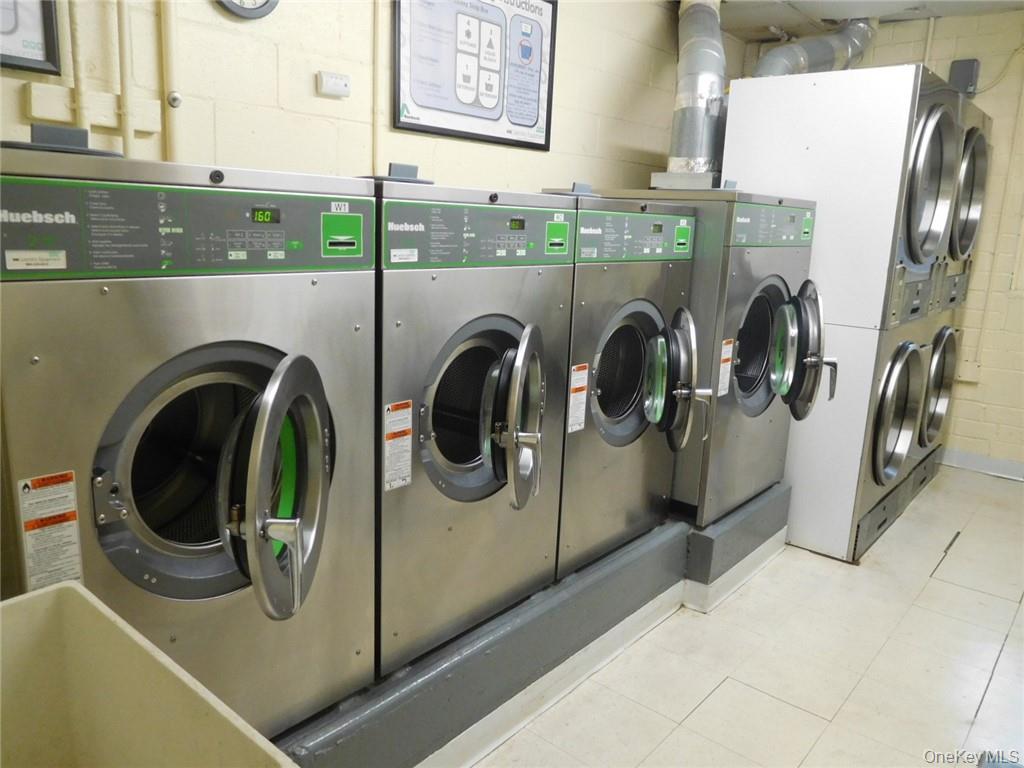 4 Consulate Drive, Unit 1M Tuckahoe, NY 10707 - Photo 17 of 17 a utility room with dryer and washer