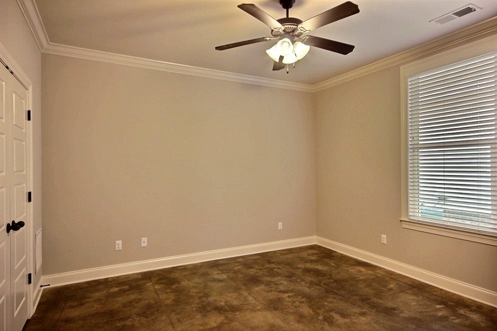 186 East South Street, Unit 1 Collierville, TN 38017 - Photo 10 of 22 a view of an empty room with a window