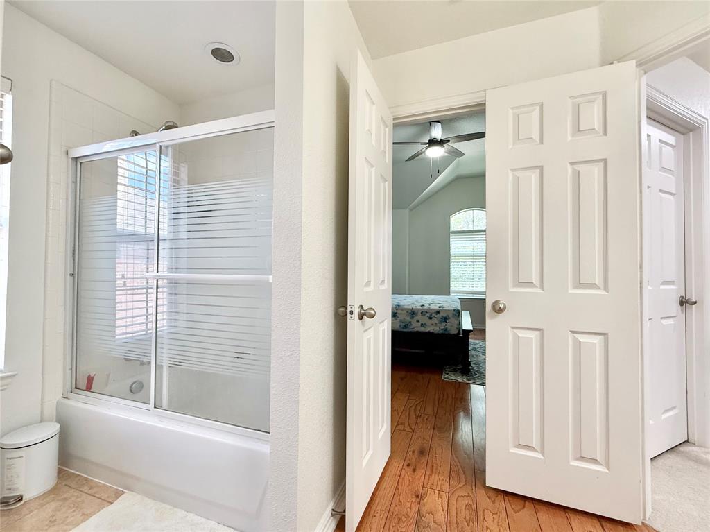 2754 Ridge View Road Frisco, TX 75034 - Photo 22 of 34 a bathroom with a bathtub and a toilet