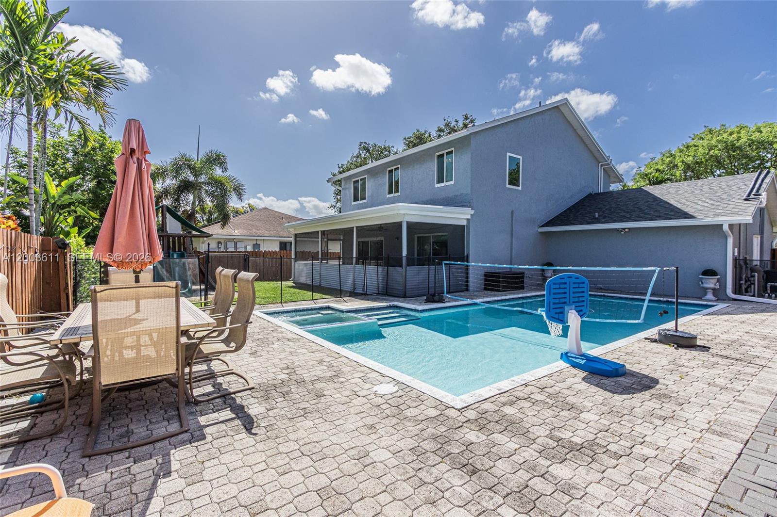 7941 Northwest 3rd Place Plantation, FL 33324 - Photo 11 of 51 a view of a house with backyard porch and sitting area