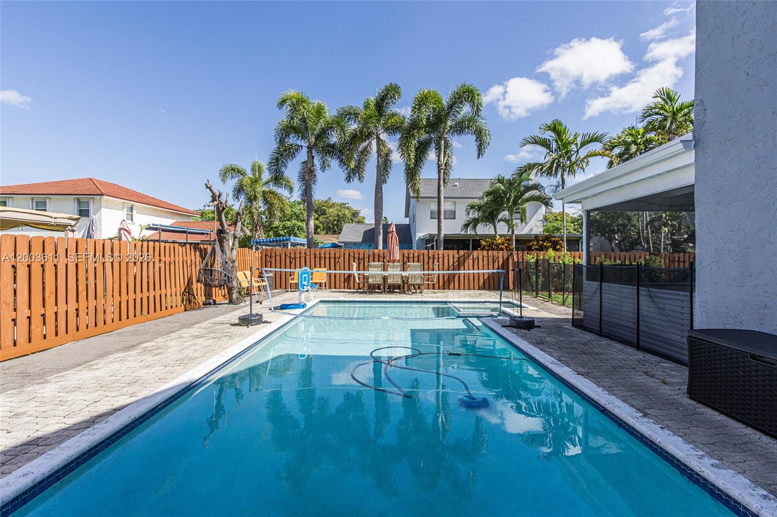 7941 Northwest 3rd Place Plantation, FL 33324 - Photo 13 of 51 a view of swimming pool with outdoor seating