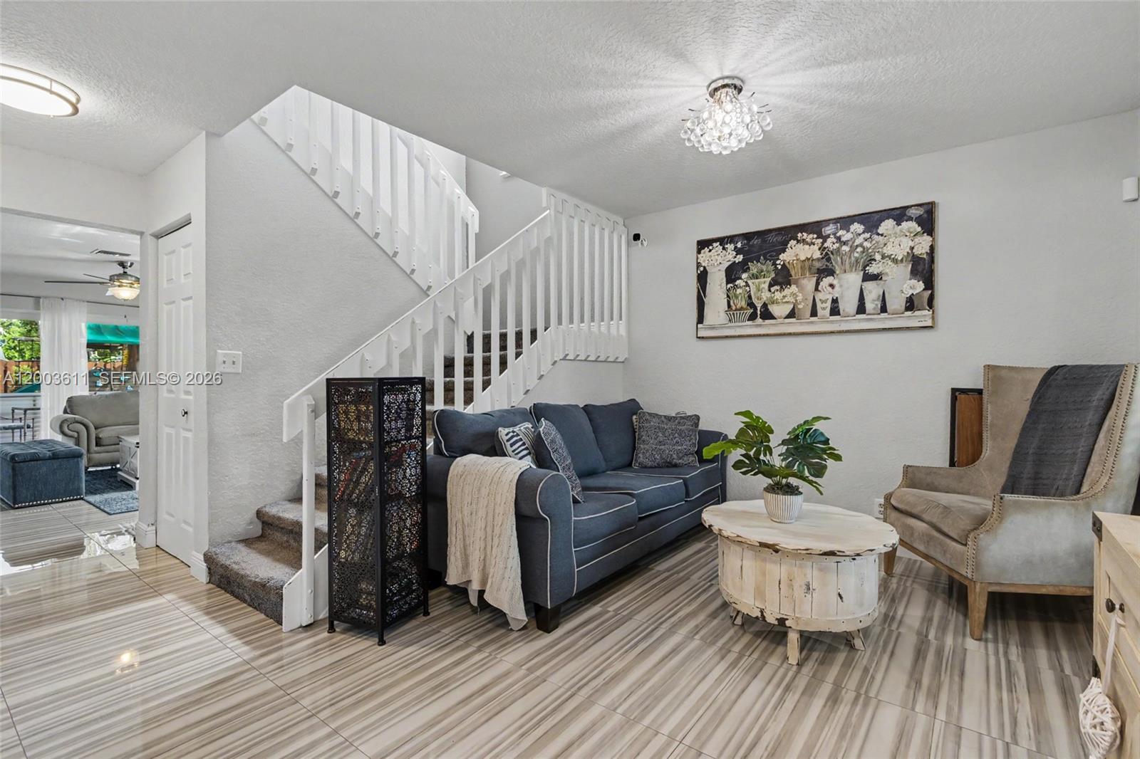 7941 Northwest 3rd Place Plantation, FL 33324 - Photo 18 of 51 a living room with furniture and wooden floor