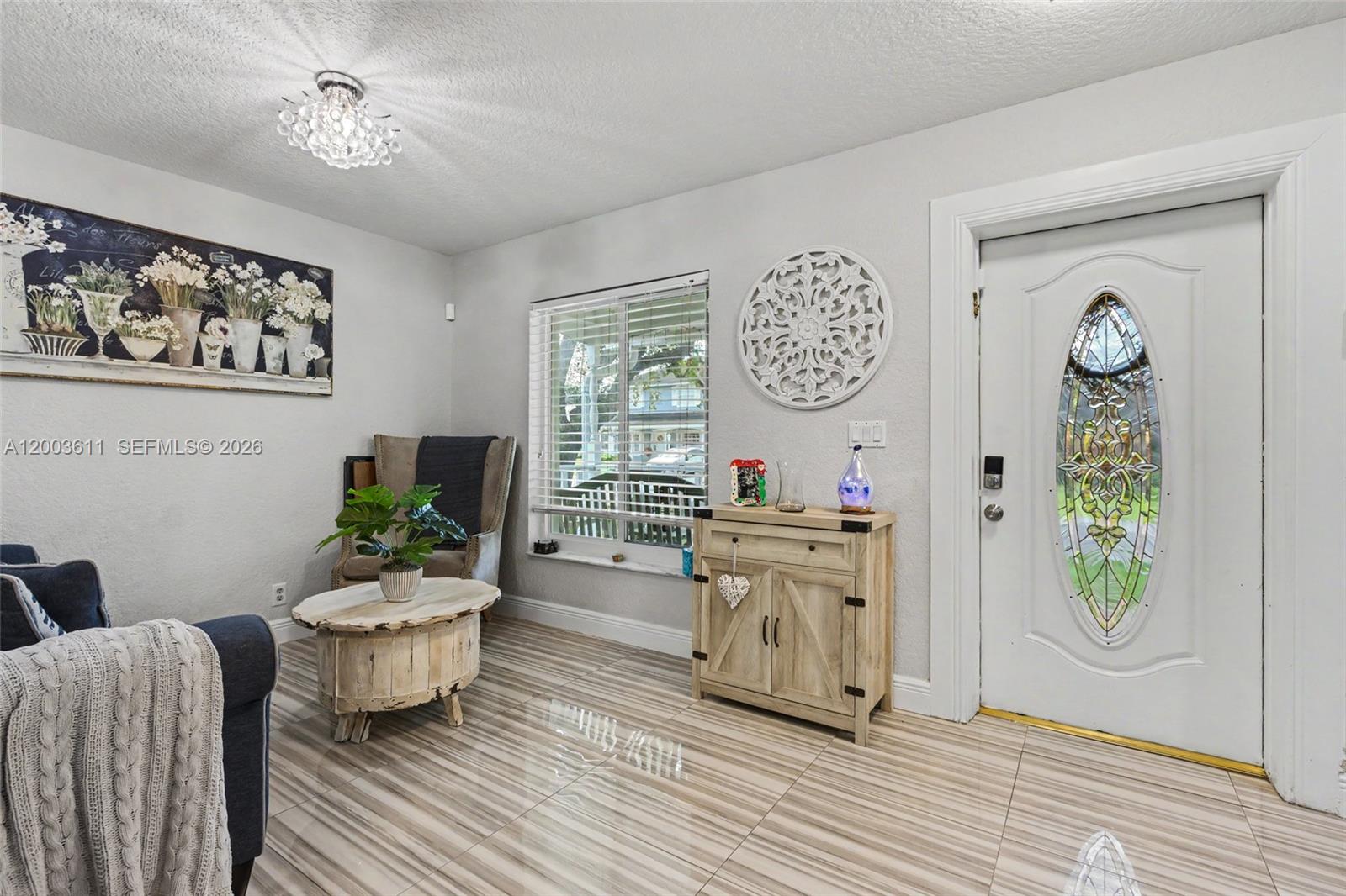 7941 Northwest 3rd Place Plantation, FL 33324 - Photo 20 of 51 a living room with furniture and a window