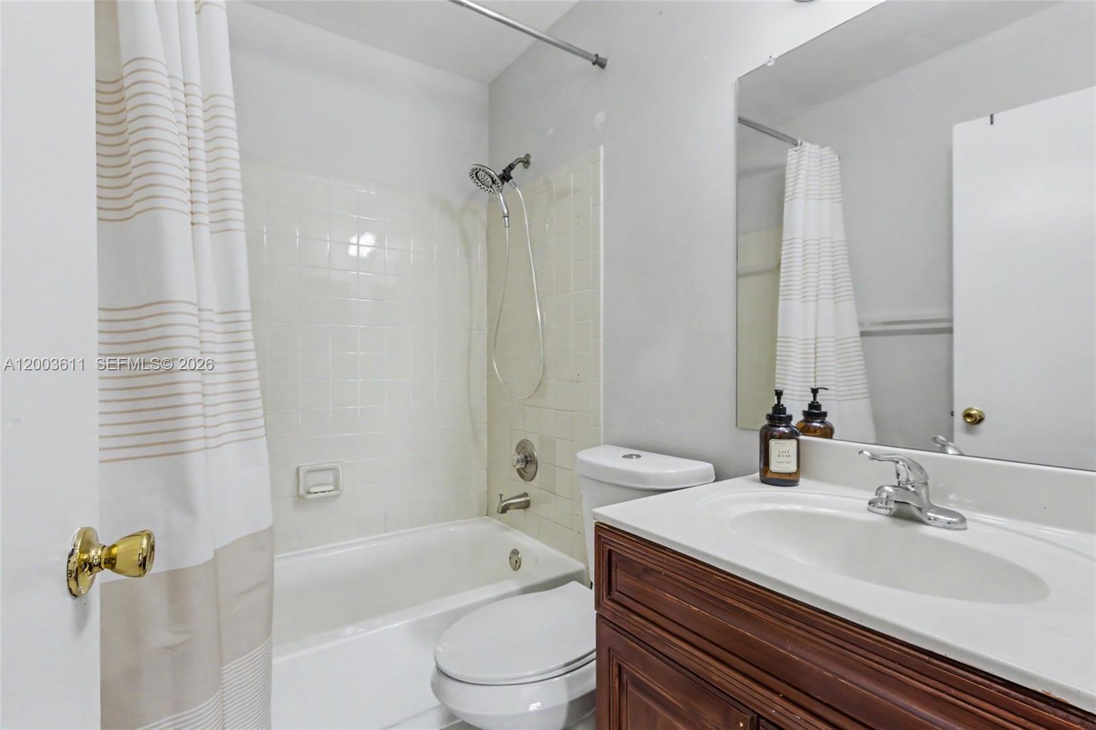 7941 Northwest 3rd Place Plantation, FL 33324 - Photo 37 of 51 a bathroom with a sink toilet and shower