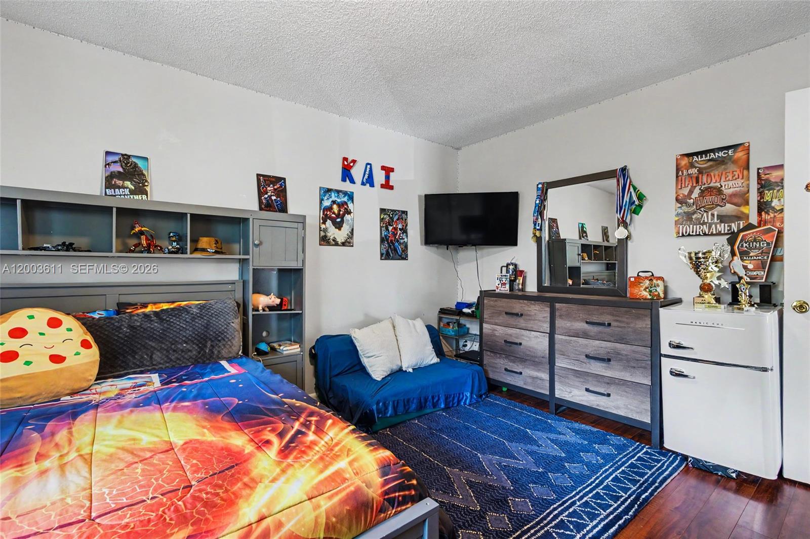 7941 Northwest 3rd Place Plantation, FL 33324 - Photo 43 of 51 a bedroom with a bed and furniture