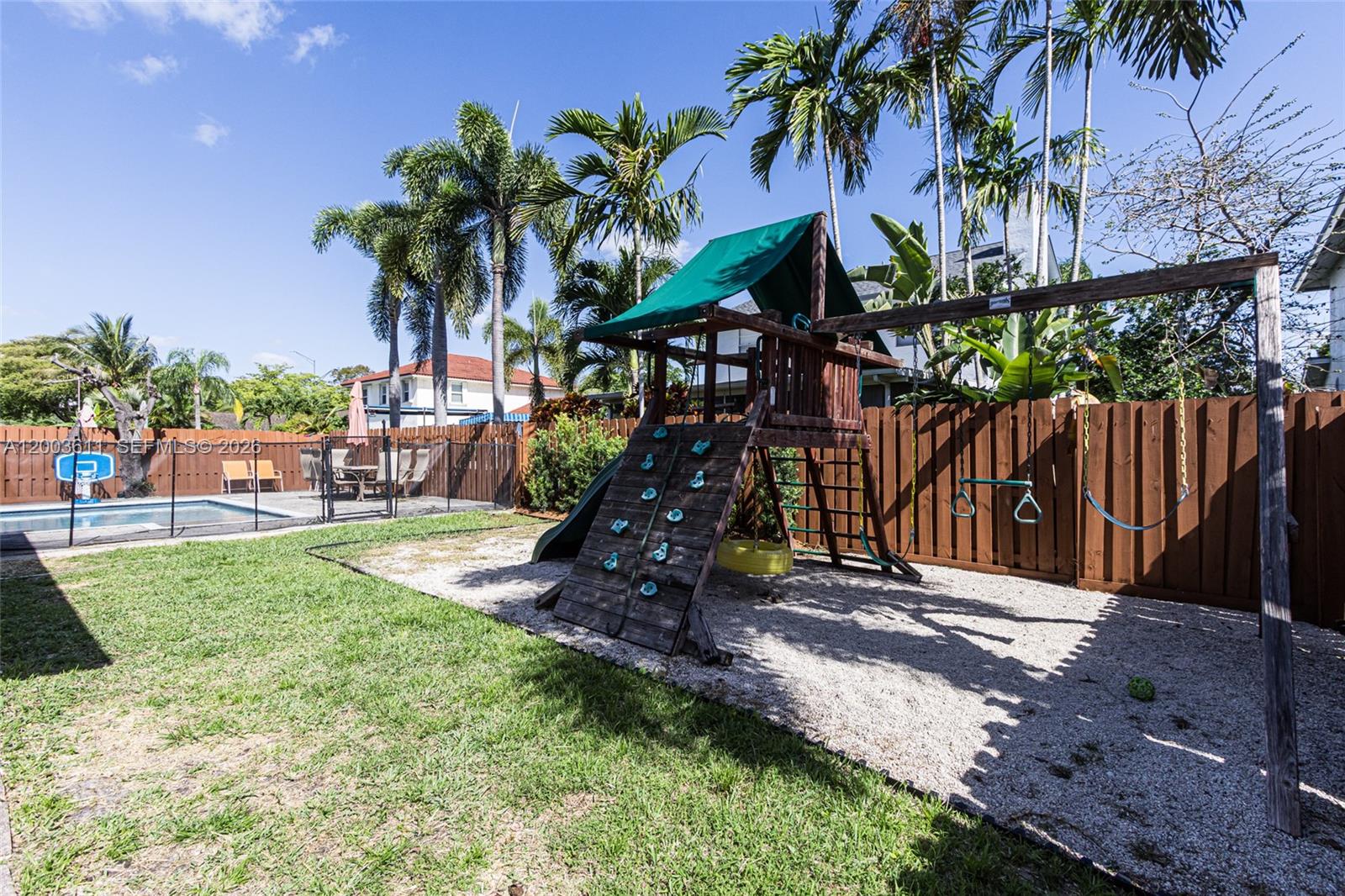 7941 Northwest 3rd Place Plantation, FL 33324 - Photo 6 of 51 a backyard of a house with seating space