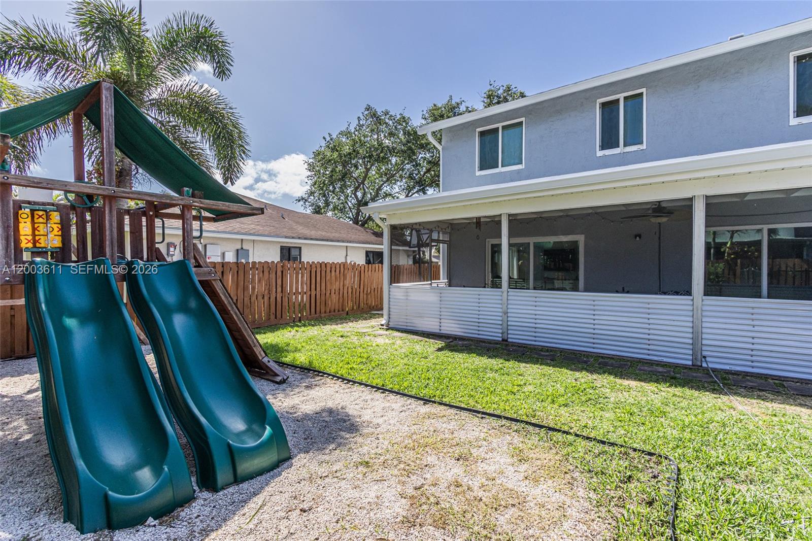 7941 Northwest 3rd Place Plantation, FL 33324 - Photo 7 of 51 a view of a house with backyard and sitting area
