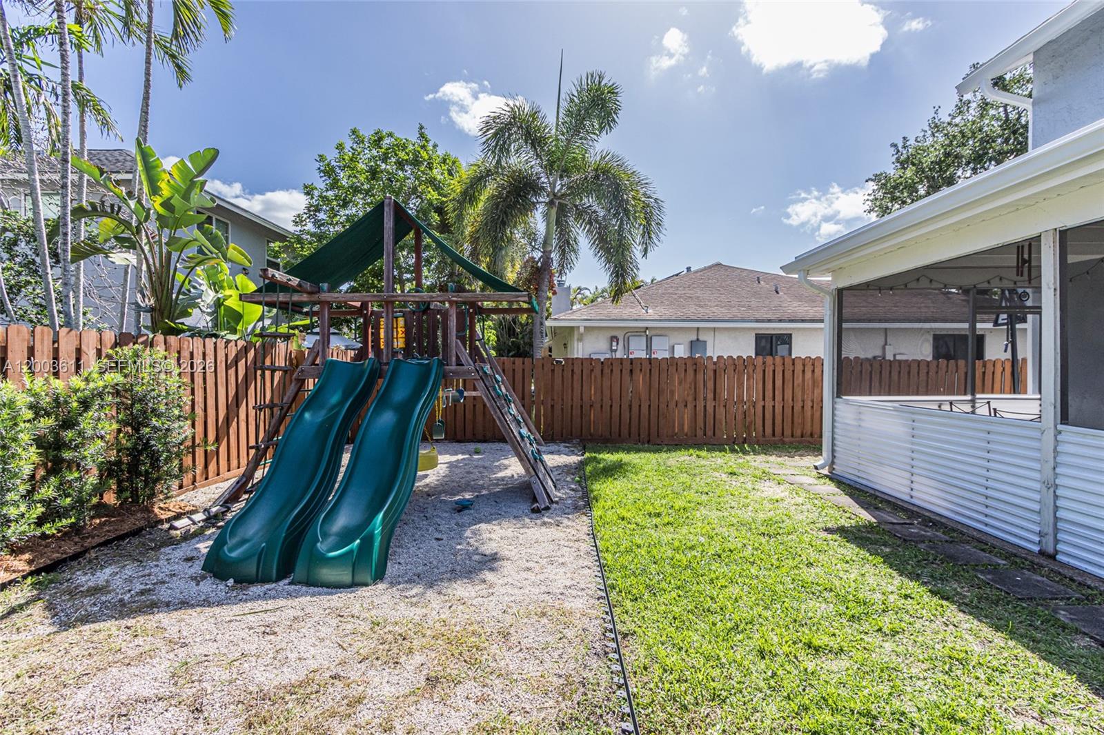 7941 Northwest 3rd Place Plantation, FL 33324 - Photo 9 of 51 a view of a backyard with a garden