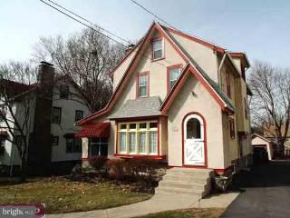 56 Harvard Road Havertown, PA 19083 - Photo 1 of 1 a front view of a house with garden
