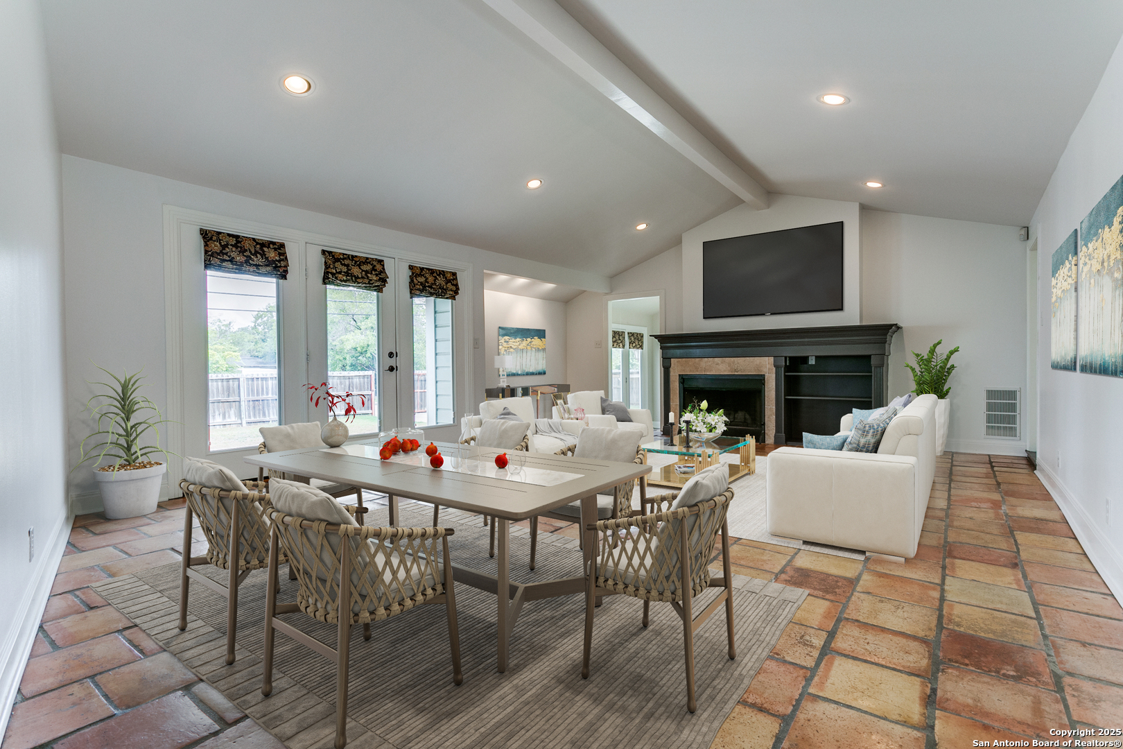 246 Brees Boulevard San Antonio, TX 78209 - Photo 1 of 1 a dining room with furniture a window and a fireplace