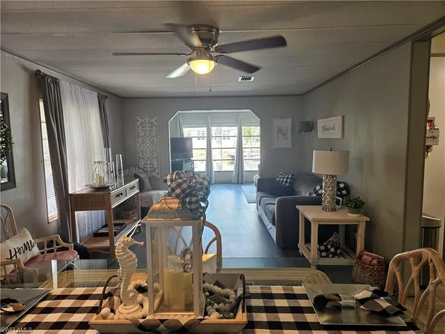 a view of a livingroom with furniture and a fireplace