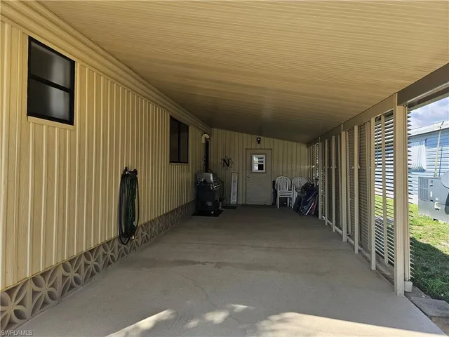 a view of a porch with furniture
