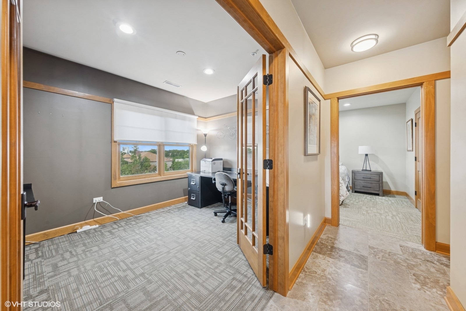 14 South Prospect Street, Unit 508 Roselle, IL 60172 - Photo 13 of 23 a view of a hallway with a livingroom and a bathroom