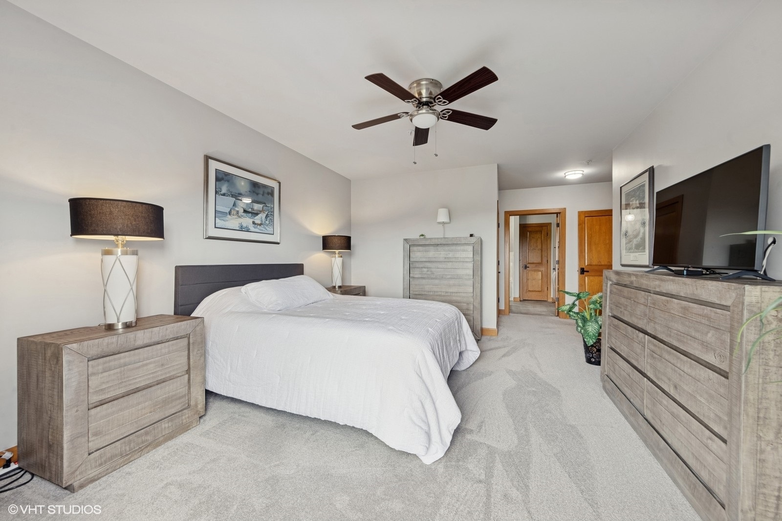 14 South Prospect Street, Unit 508 Roselle, IL 60172 - Photo 17 of 23 a bedroom with a bed and a flat screen tv