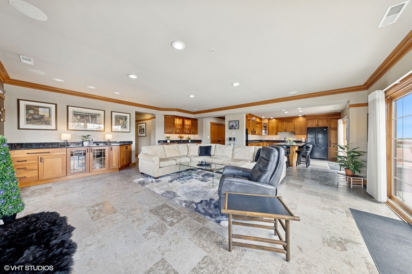 14 South Prospect Street, Unit 508 Roselle, IL 60172 - Photo 5 of 23 a living room with furniture and a table
