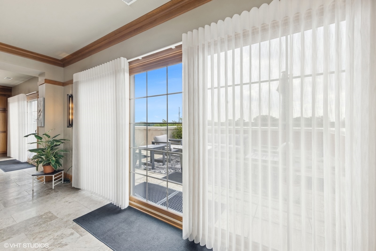 14 South Prospect Street, Unit 508 Roselle, IL 60172 - Photo 9 of 23 a view of a livingroom with wooden floor and a potted plant