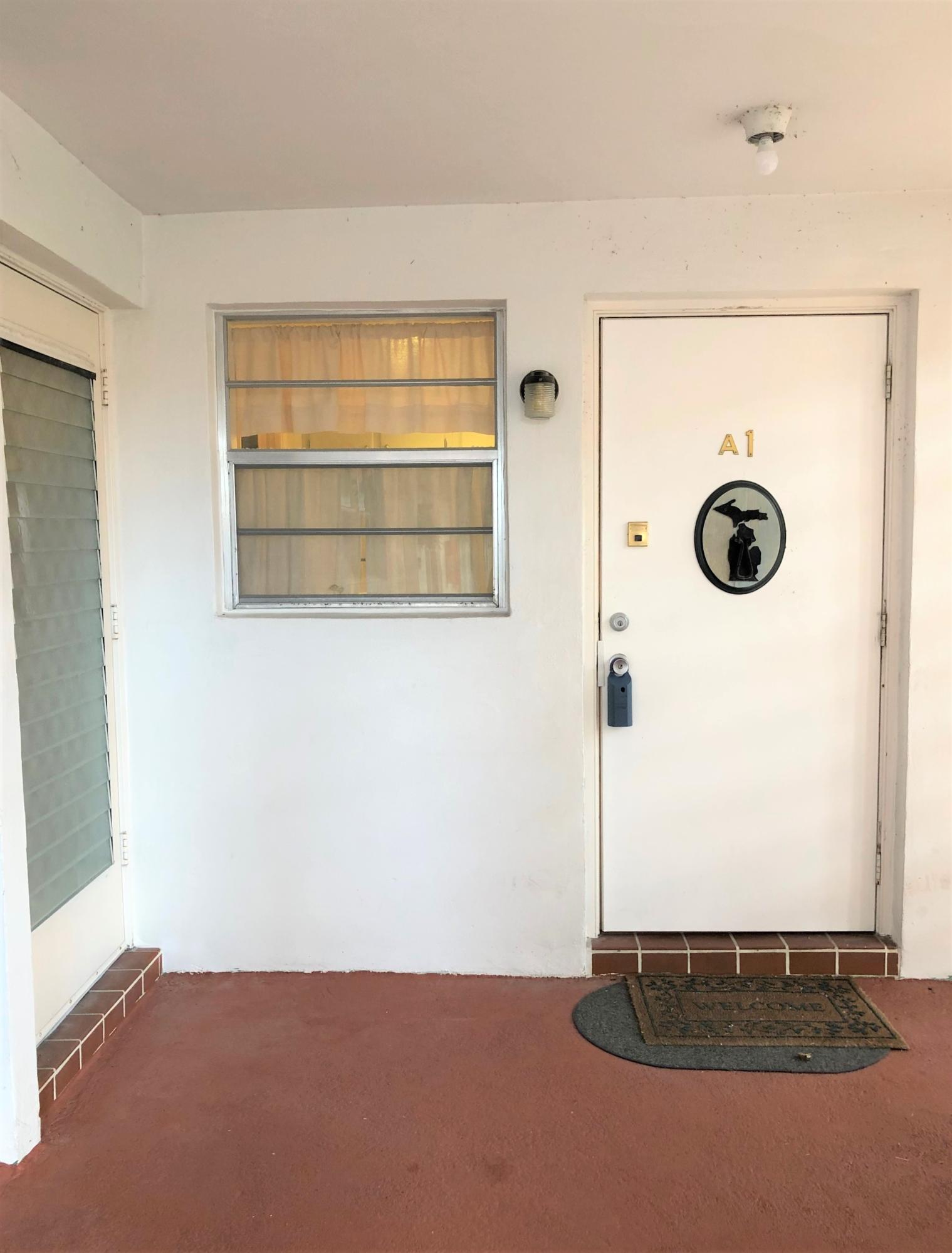25 Southeast 13th Street, Unit A1 Boca Raton, FL 33432 - Photo 17 of 24 FRONT ENTRY