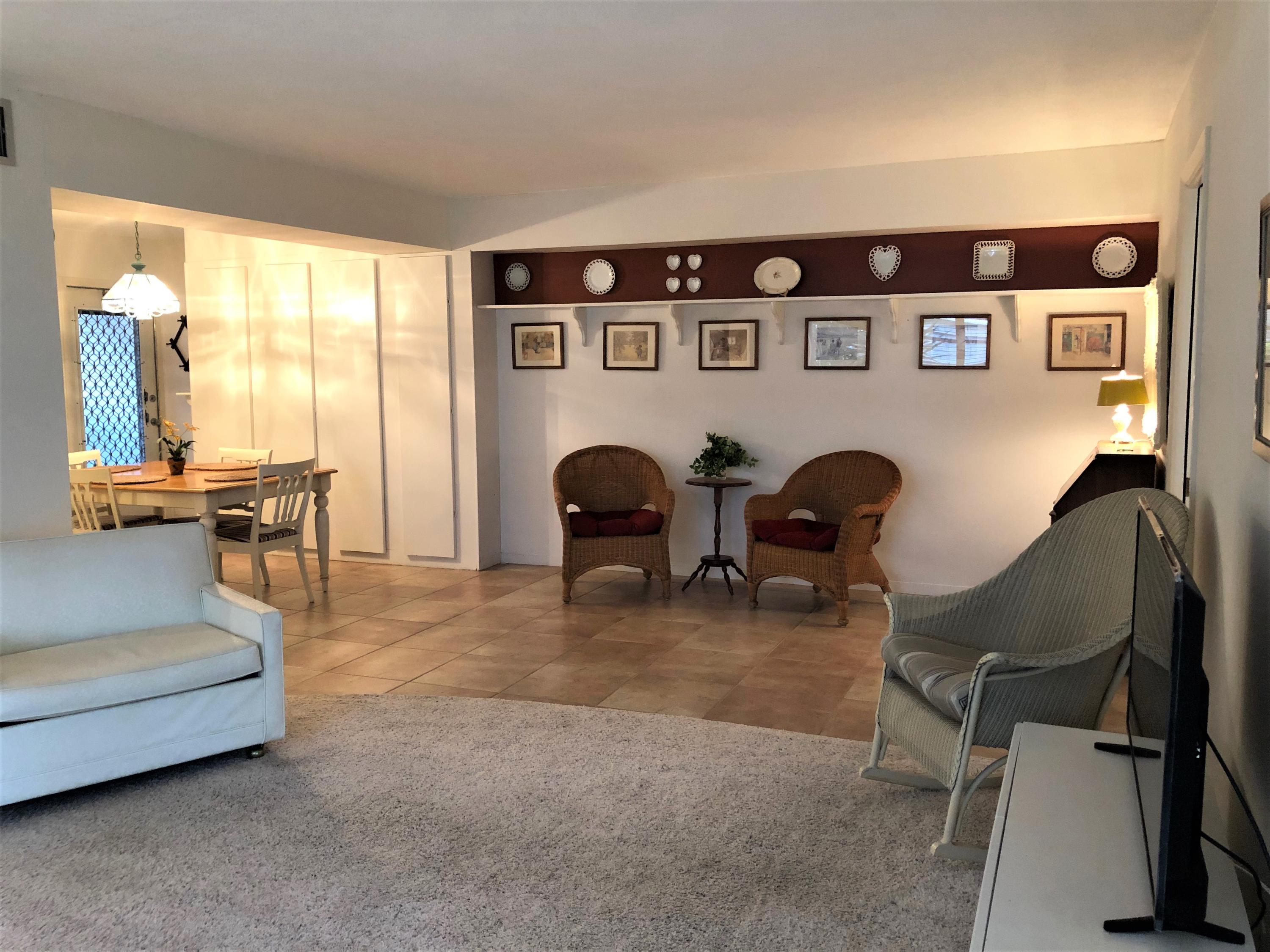 25 Southeast 13th Street, Unit A1 Boca Raton, FL 33432 - Photo 4 of 24 LIVING ROOM/SITTING AREA