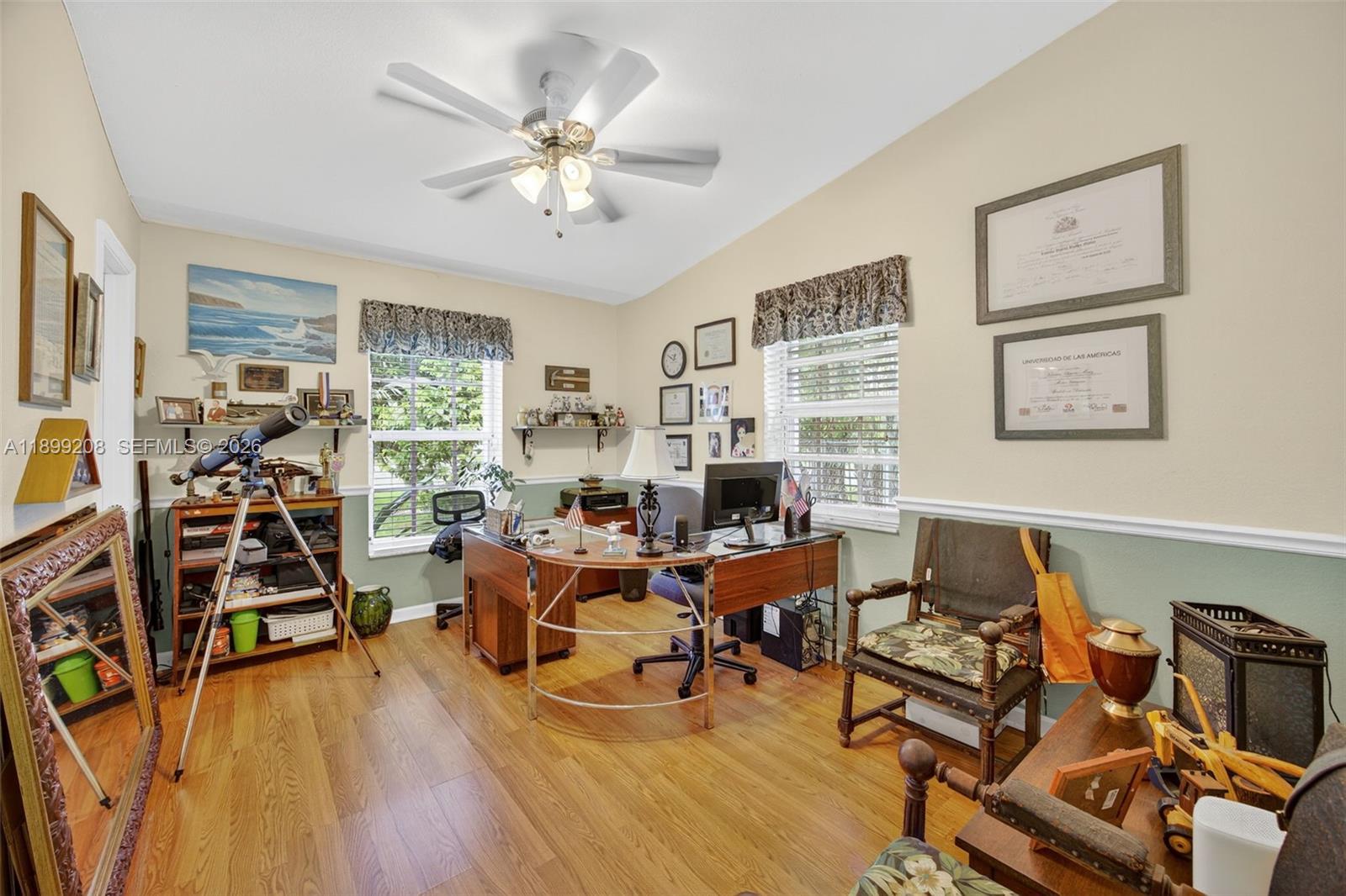 28241 Southwest 157th Court Homestead, FL 33033 - Photo 18 of 52 a living room with furniture and wooden floor