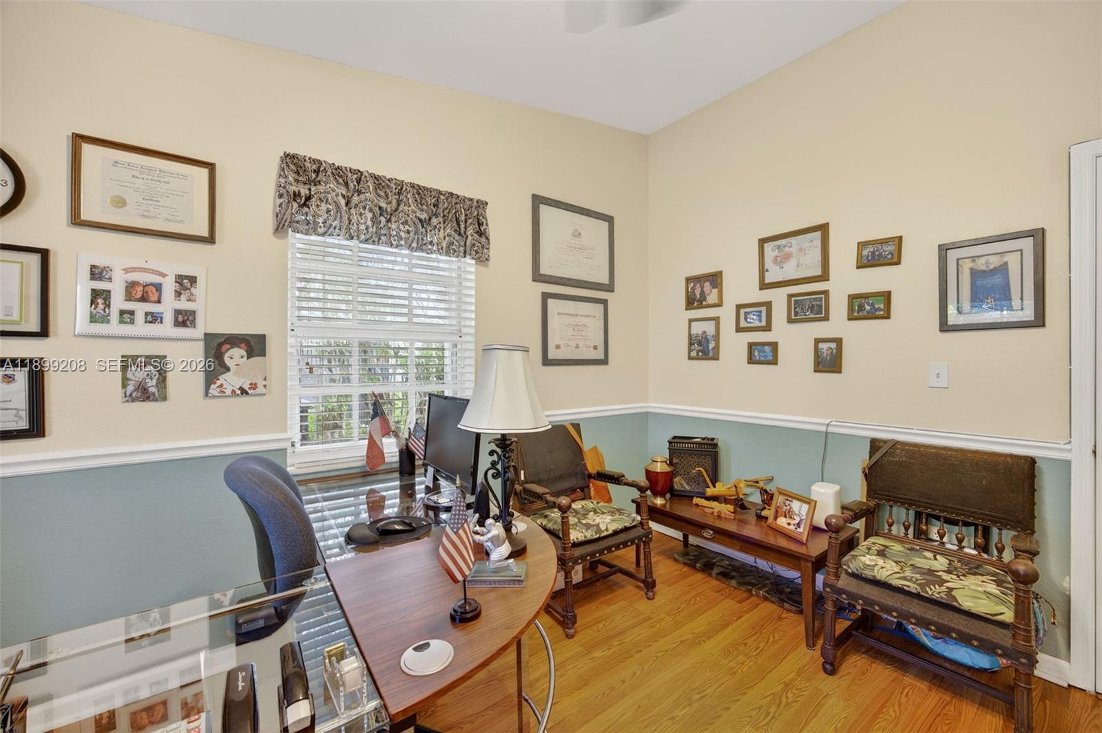 28241 Southwest 157th Court Homestead, FL 33033 - Photo 19 of 52 a living room with furniture and a window