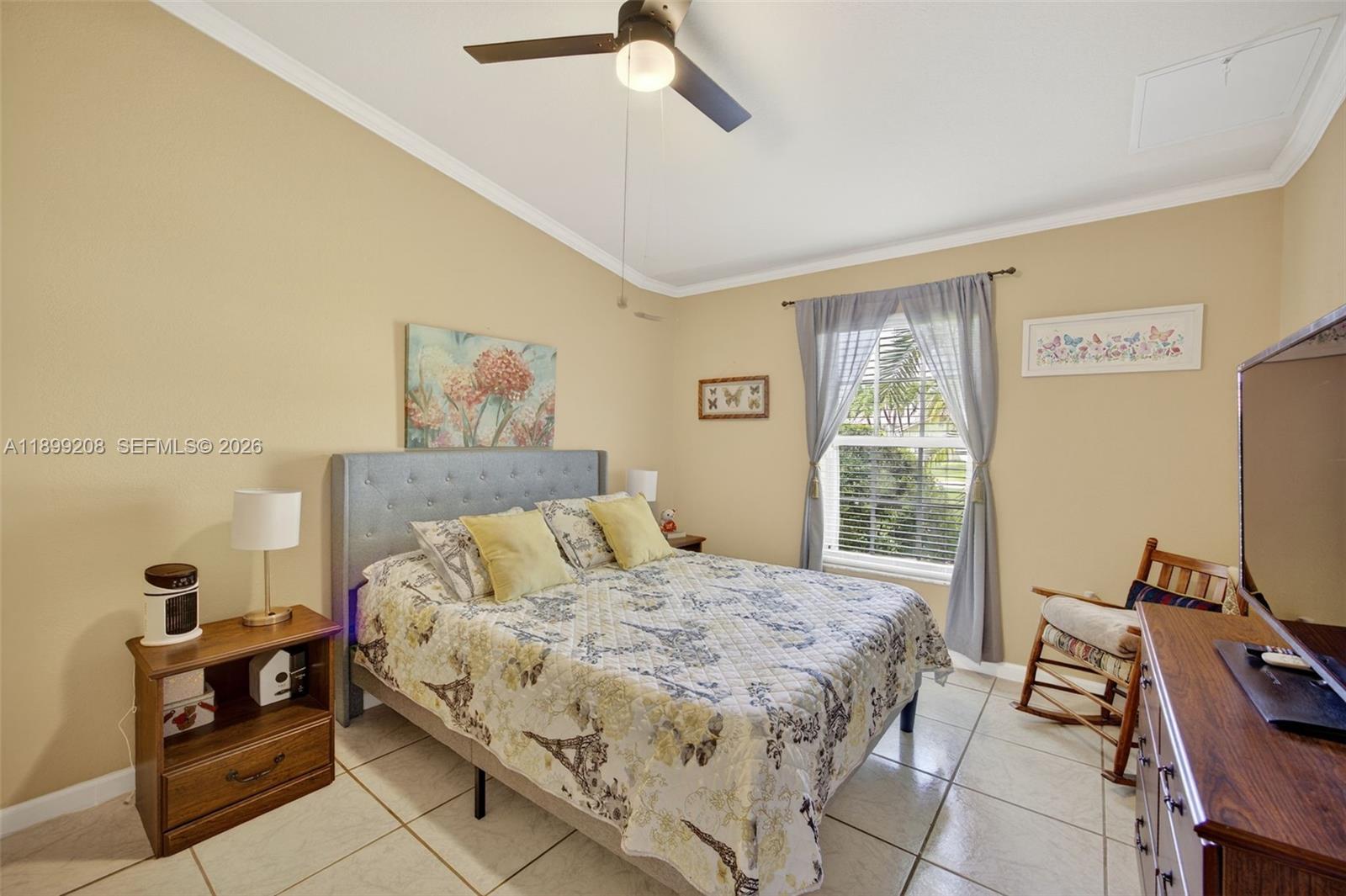28241 Southwest 157th Court Homestead, FL 33033 - Photo 22 of 52 a bedroom with a bed and wooden floor