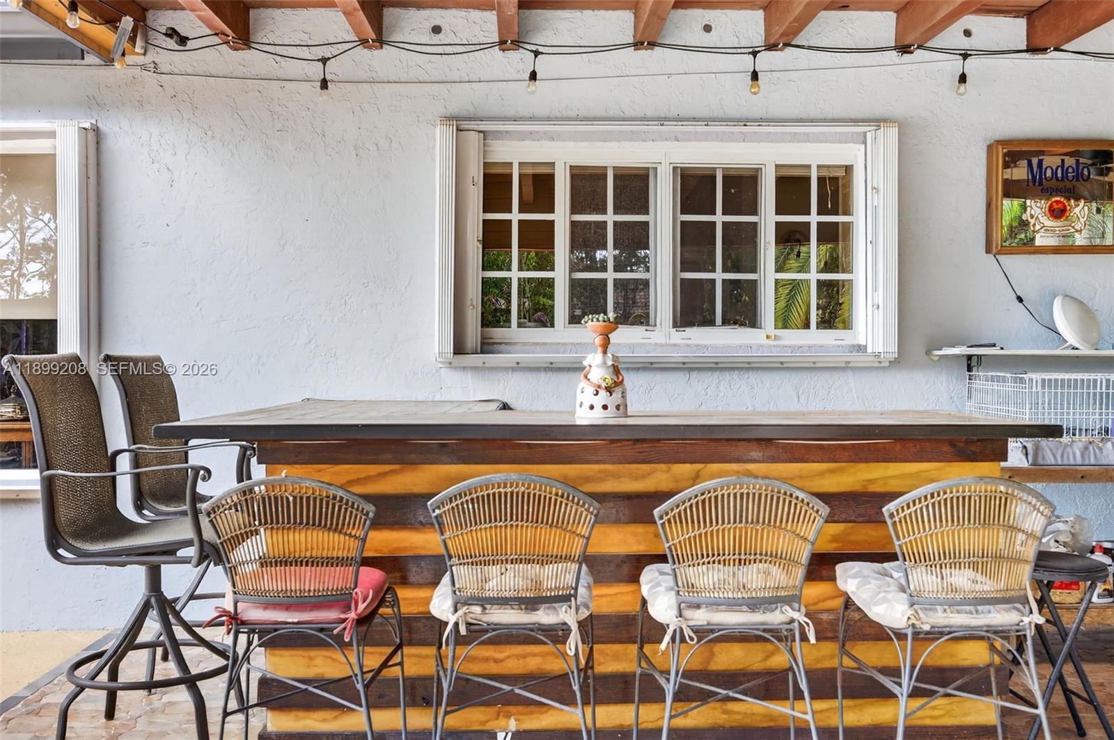 28241 Southwest 157th Court Homestead, FL 33033 - Photo 38 of 52 a blue white and blue chair sitting in front of a house