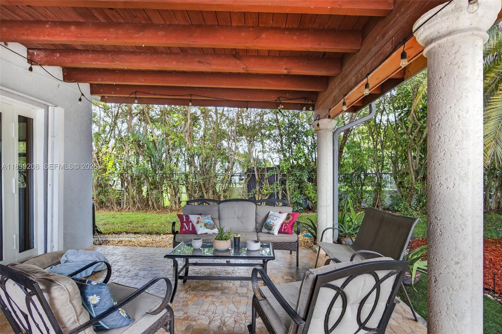 28241 Southwest 157th Court Homestead, FL 33033 - Photo 39 of 52 a outdoor view with a sitting space