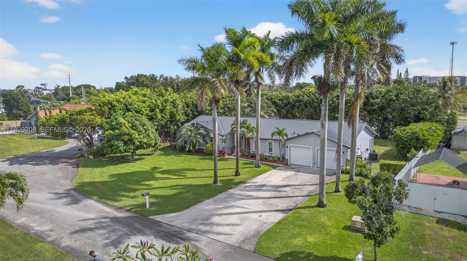 28241 Southwest 157th Court Homestead, FL 33033 - Photo 43 of 52 a view of a park with a palm tree