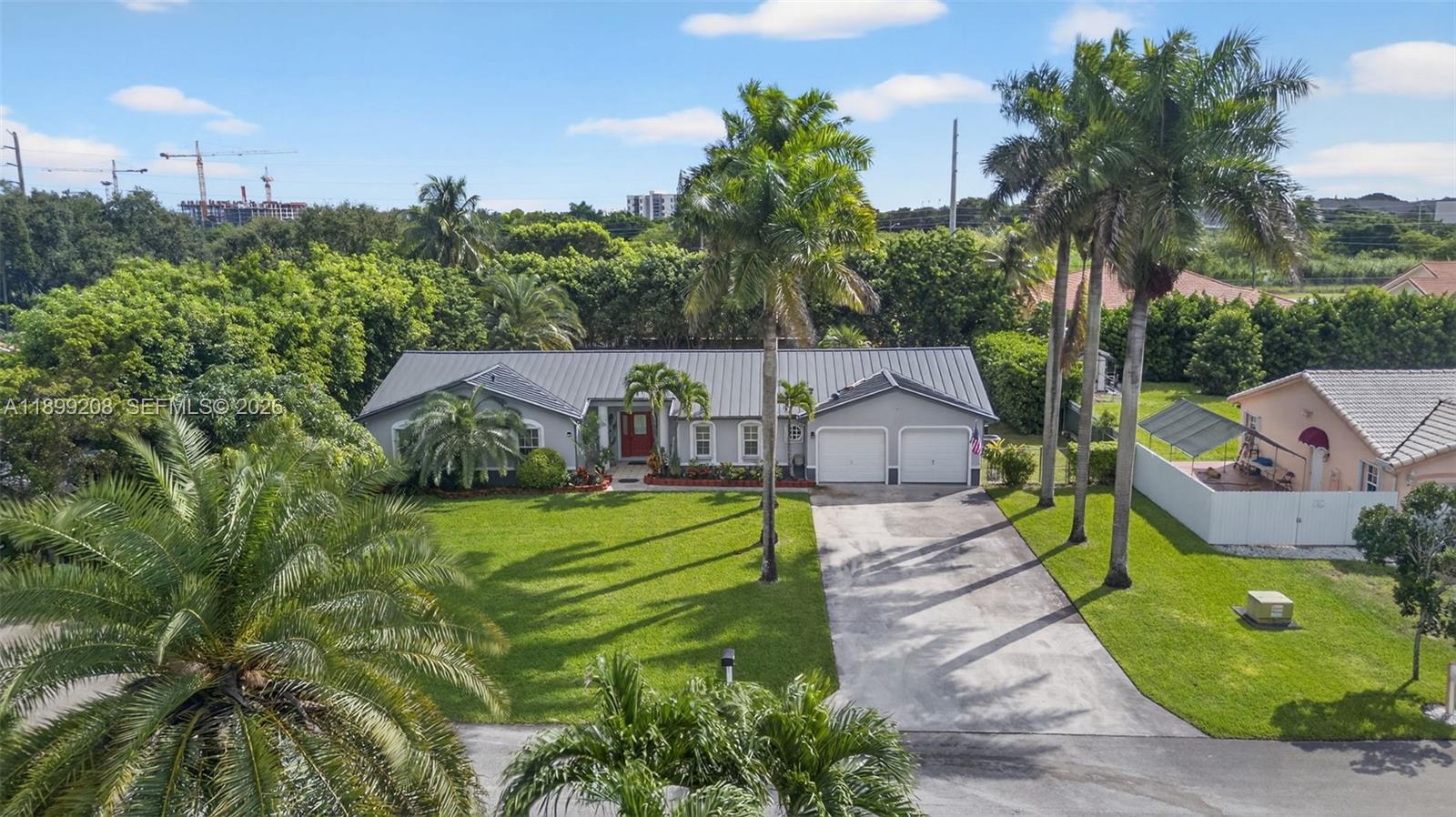 28241 Southwest 157th Court Homestead, FL 33033 - Photo 44 of 52 an aerial view of a house with a garden and trees