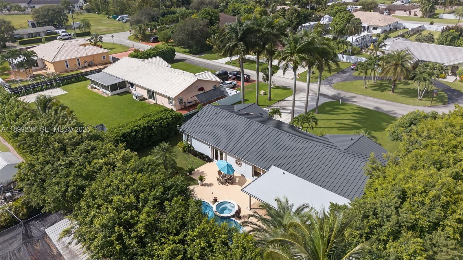 28241 Southwest 157th Court Homestead, FL 33033 - Photo 46 of 52 an aerial view of a house with garden space and street view