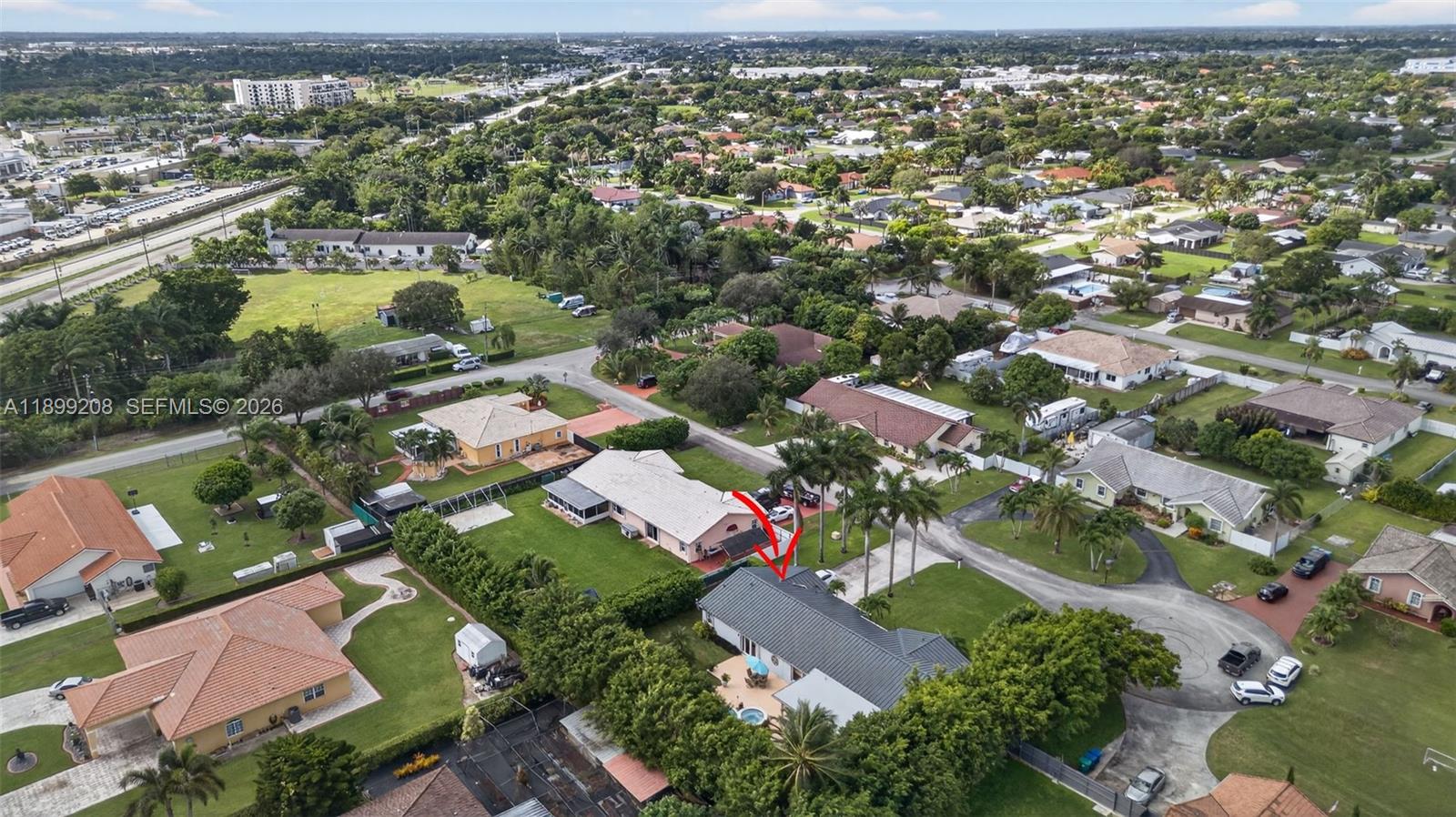 28241 Southwest 157th Court Homestead, FL 33033 - Photo 48 of 52 an aerial view of residential houses with outdoor space