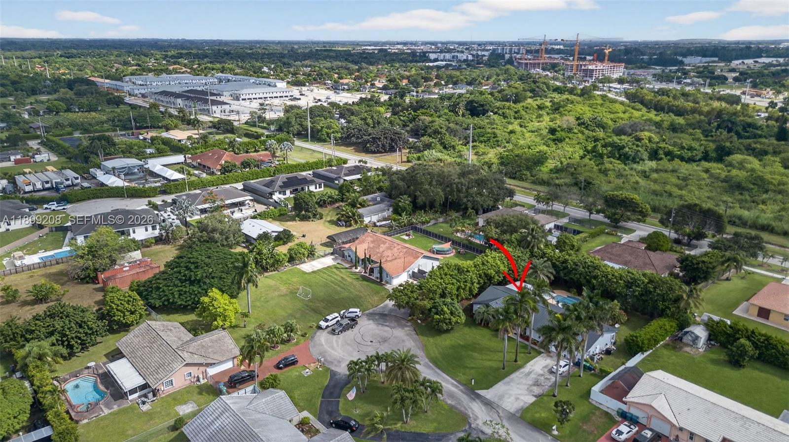 28241 Southwest 157th Court Homestead, FL 33033 - Photo 50 of 52 an aerial view of a city with lots of residential buildings