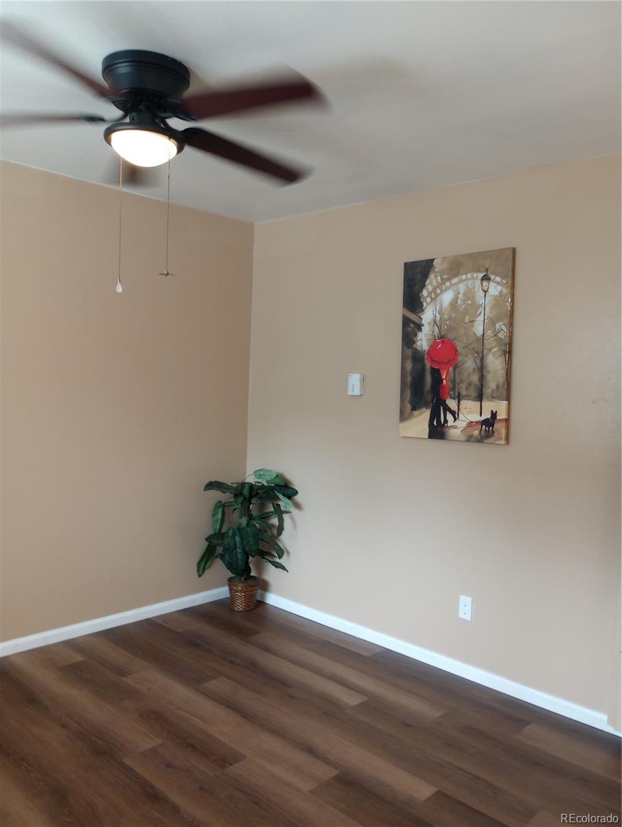 111 Crystal Park Road, Unit 2 Manitou Springs, CO 80829 - Photo 9 of 22 a view of a livingroom with wooden floor