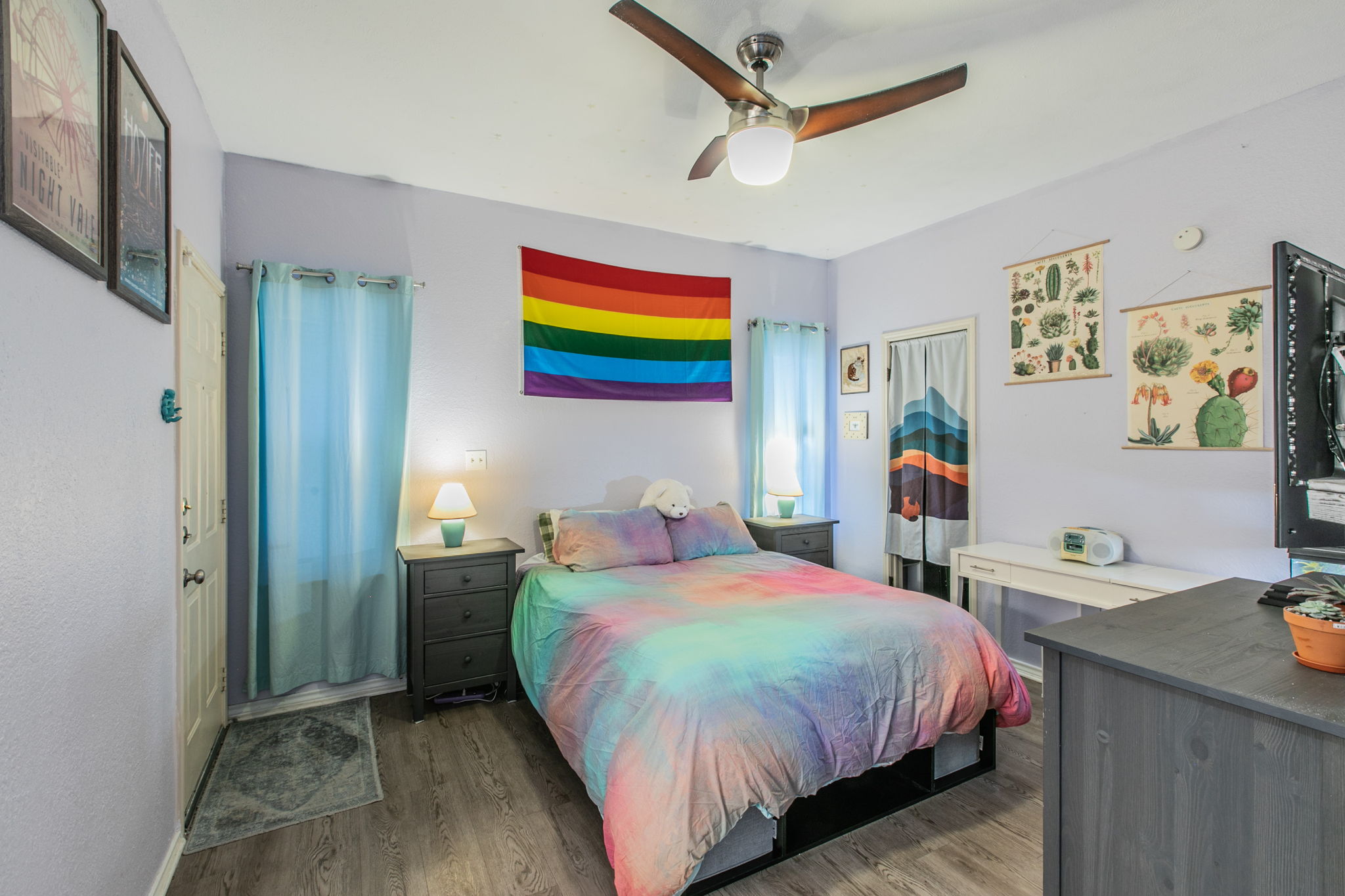 1005 North LBJ Drive, Unit B2 San Marcos, TX 78666 - Photo 7 of 19 a bedroom with a bed and a desk