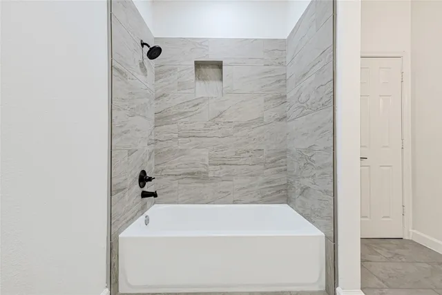 a bathroom with a bathtub