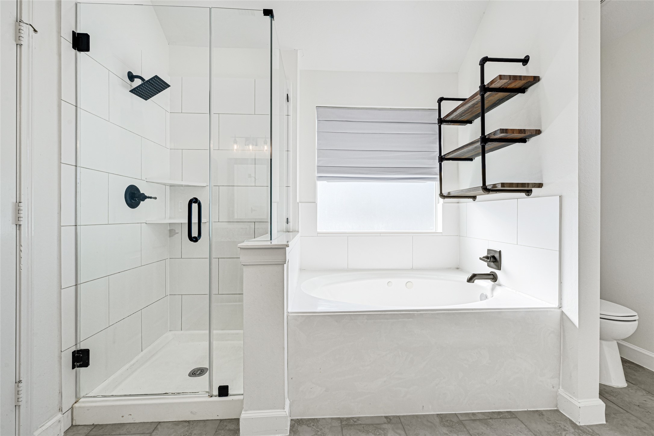 16502 Barker Ranch Court Cypress, TX 77429 - Photo 19 of 21 a bathroom with a shower