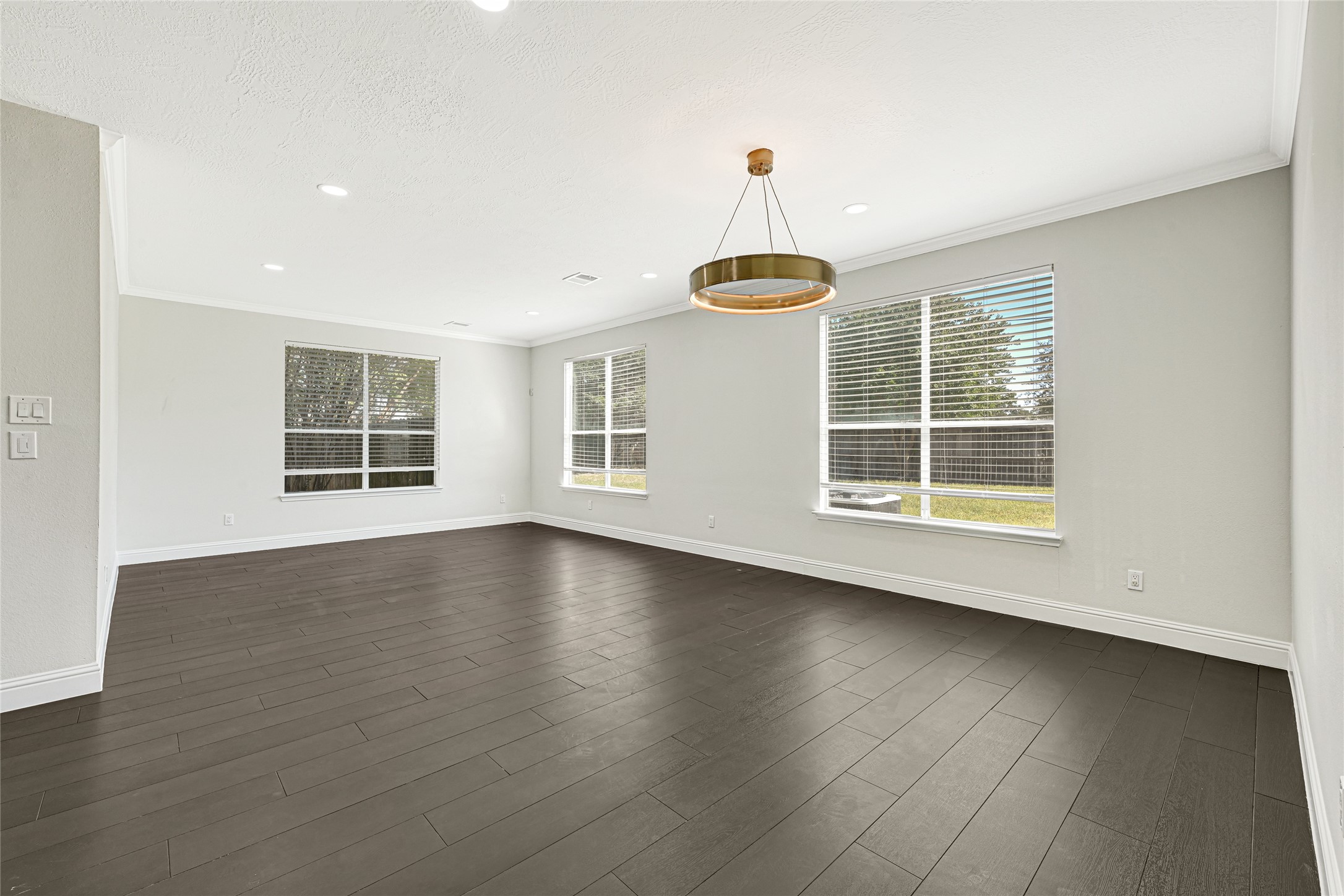 16502 Barker Ranch Court Cypress, TX 77429 - Photo 3 of 21 a view of wooden floor and windows in a room