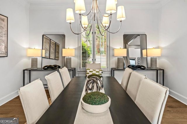 a kitchen with a sink cabinets and window
