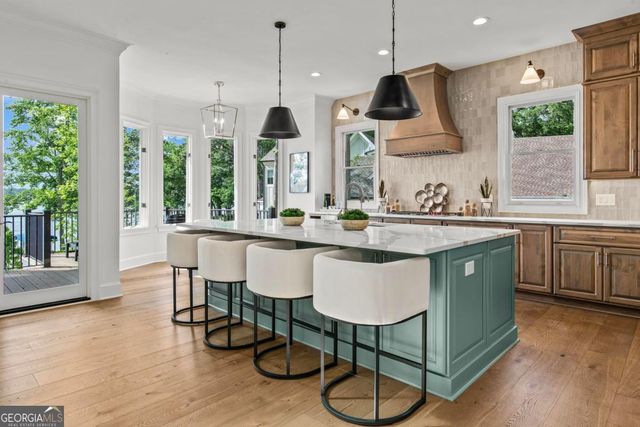 a living room with furniture a rug and a fireplace