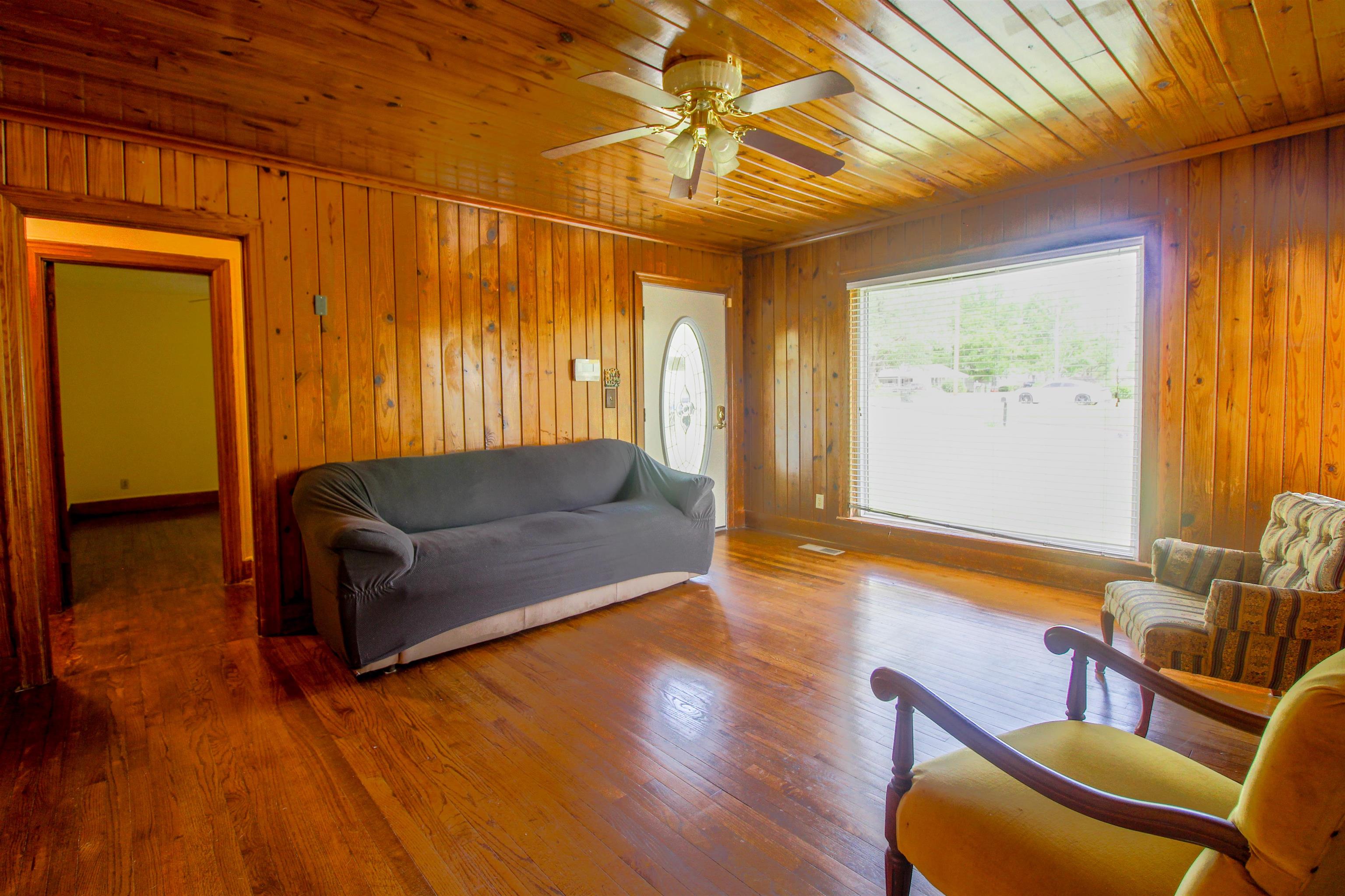274 Joann Street Ripley, TN 38063 - Photo 2 of 28 a living room with furniture and a wooden floor
