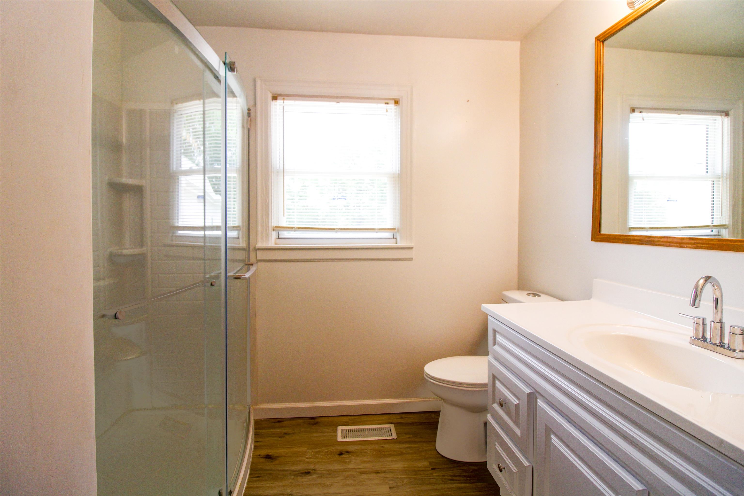 274 Joann Street Ripley, TN 38063 - Photo 23 of 28 a bathroom with a sink a toilet and a window