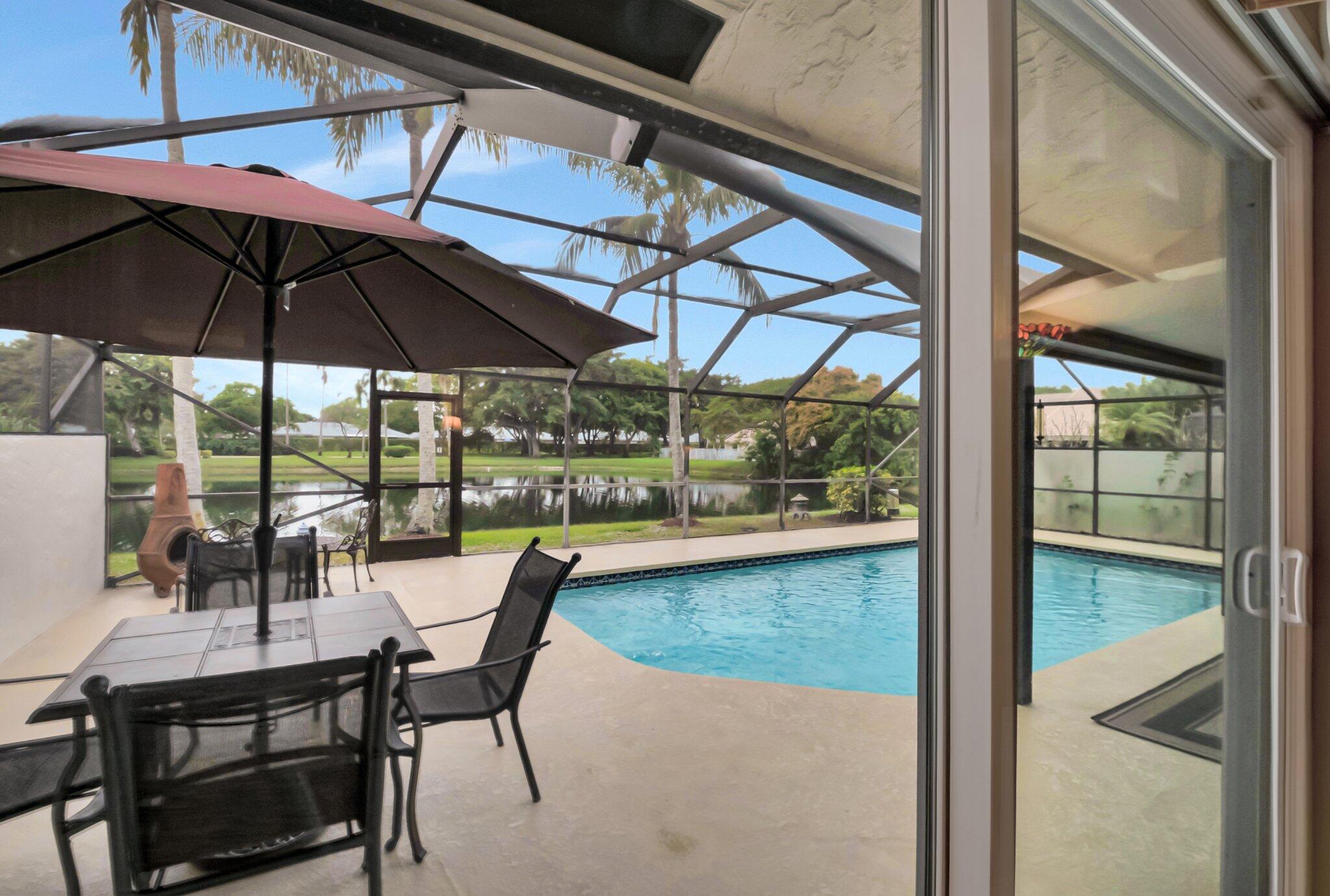 9758 Erica Court Boca Raton, FL 33496 - Photo 24 of 74 Screenenclosed patio